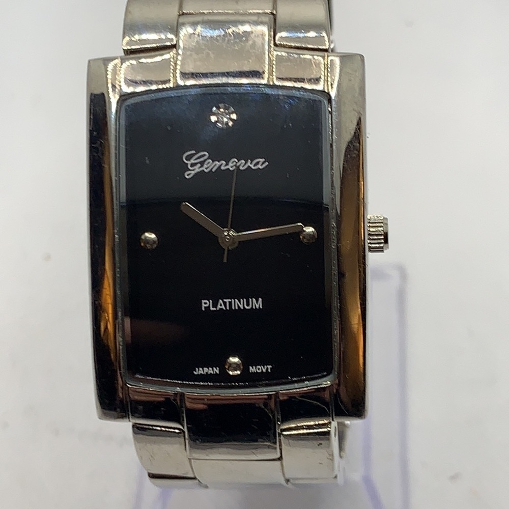3/$27.   Geneva Platinum men’s watch